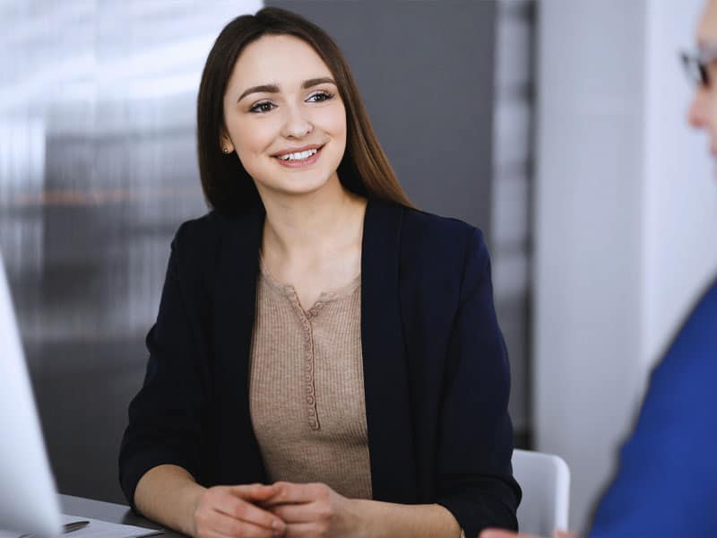 a woman smiling for the camera