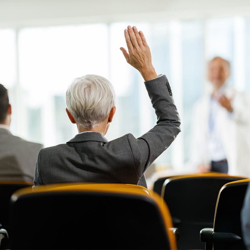 a man standing in front of a window