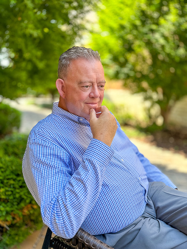 a man talking on a cell phone